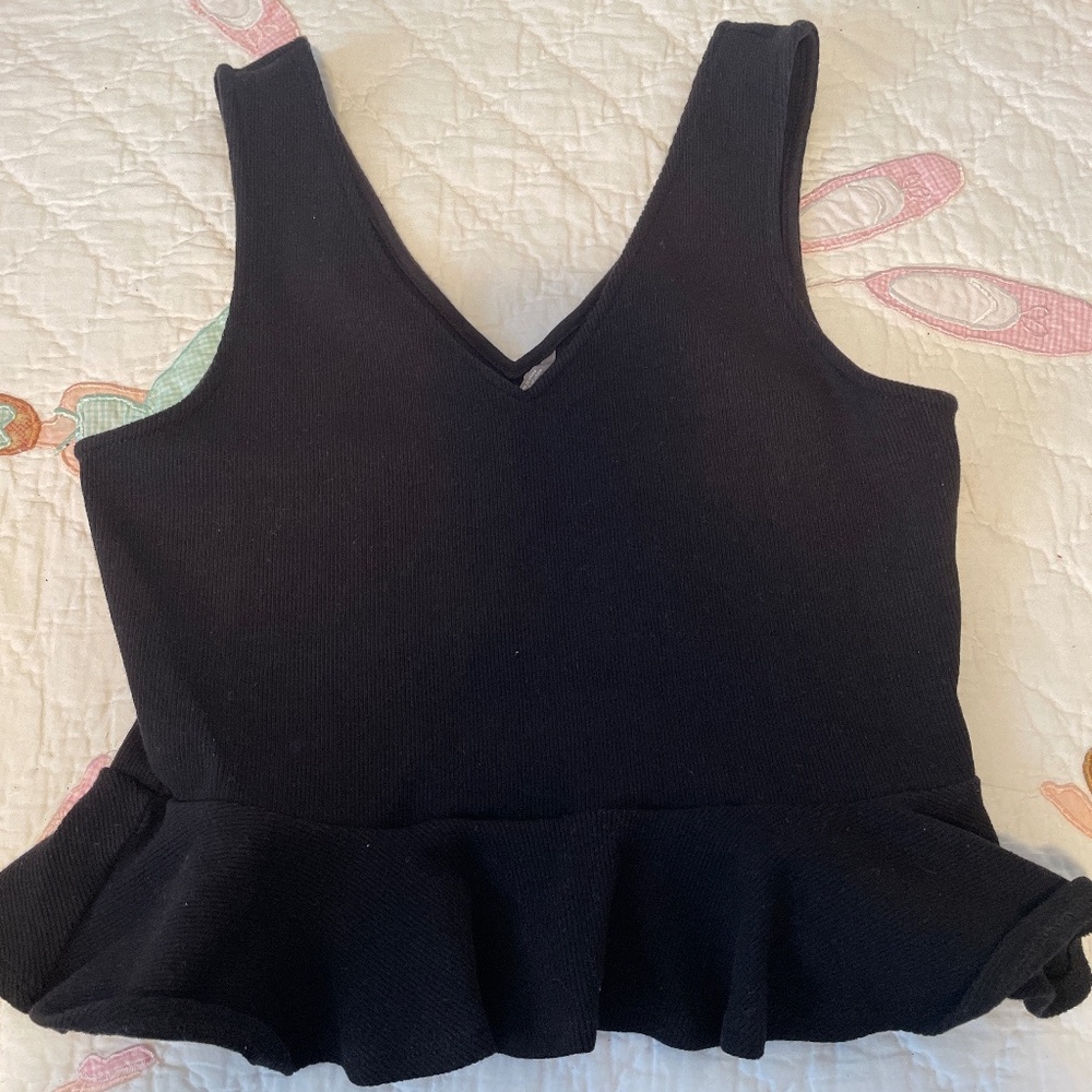 Black womens top with peblum Anthropologie